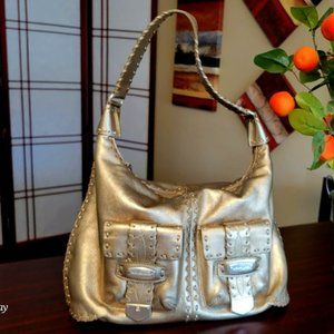 Micheal Kors gold bag.